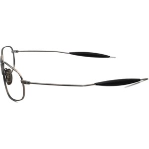 May include: A pair of eyeglasses with a thin, gunmetal-colored metal frame. The lenses are clear, and the temples have black rubberized grips. The glasses are designed with a classic, aviator-style shape.