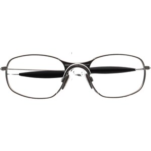 May include: A pair of rimless eyeglasses with a silver metal frame. The lenses are clear, and the nose pads are transparent. The temples have black accents. The overall design is sleek and modern.