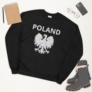 May include: Black sweatshirt with a white eagle graphic and the word "POLAND" in white text.