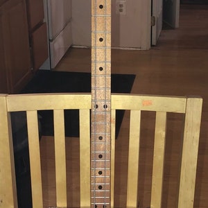 Two-String G Bass.  Art by TiJon.