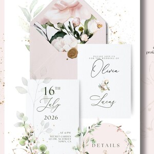 May include: Wedding invitation suite featuring a blush pink envelope with floral design, and matching cards. The invitation includes the names Olivia and Lucas, the date July 16, 2026, and the time and location of the ceremony. The design includes floral accents and gold details.