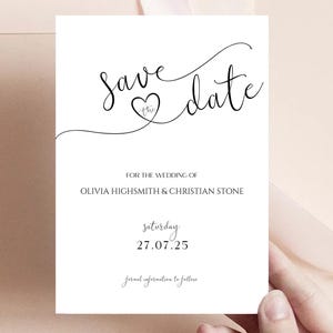 Puede incluir: Tarjeta de guardar la fecha con una fuente de escritura negra que dice "Save the date" con un símbolo de corazón. La tarjeta también incluye los nombres Olivia Highsmith & Christian Stone y la fecha sábado 27.07.25.