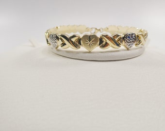 Pulsera de oro amarillo de 10k con diseño de X y corazón - Diseño Stampato bicolor