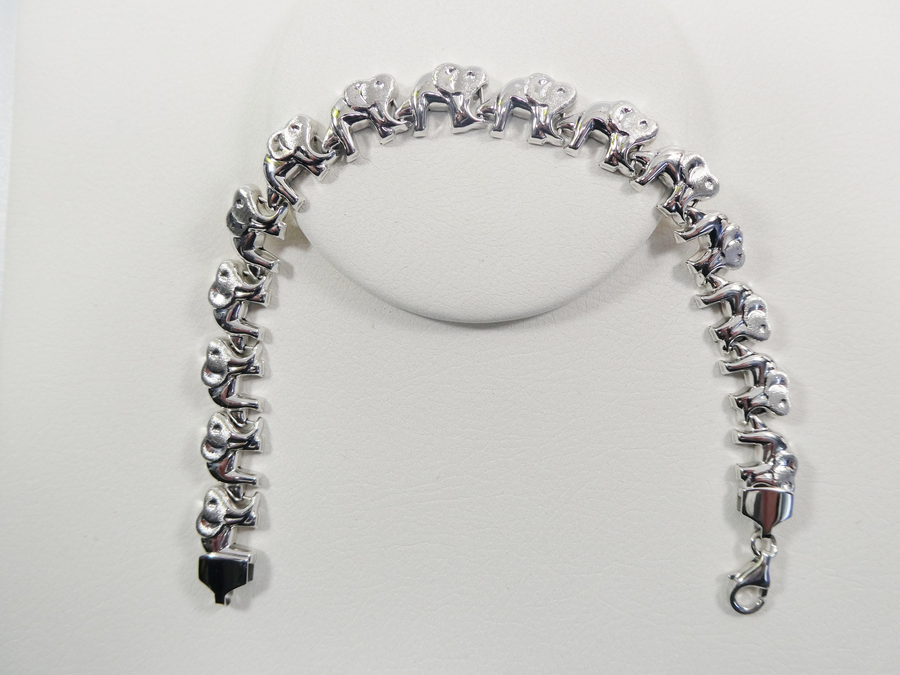 BRACCIALE VINTAGE IN ORO GIALLO, BIANCO E ROSA, 18 KT, CON ELEFANTI – Navona Antiquariato