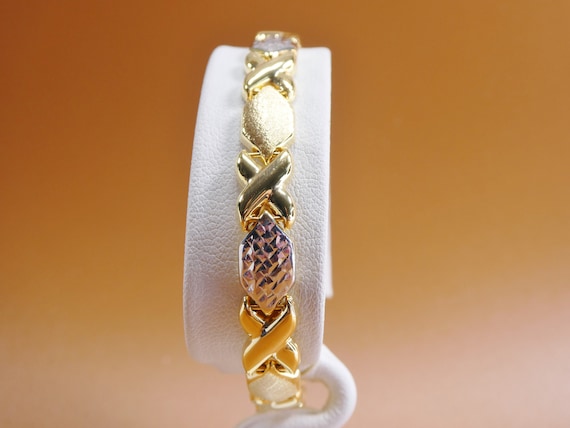 14K ゴールド サファイア ブレスレット XOXOデザイン Two Tone XOXO Bracelet: 14k Yellow Gold Finish, Sterling Silver, 8