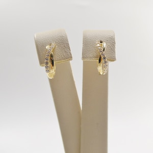 real 10k solid yellow gold xo style huggie hoop earrings