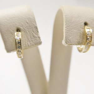 real 10k solid yellow gold earrings / cartilage daith tiny hoop huggie earring