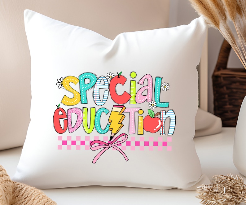 May include: White pillow with a colorful graphic that says "Special Education" with a pencil, apple, and flowers.