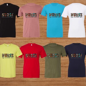 May include: A set of ten t-shirts in various colors, each featuring a colorful graphic of the word "NURSE" with the text "Every Smile Matters" underneath. The shirts are available in black, pink, blue, white, yellow, red, green, and navy.