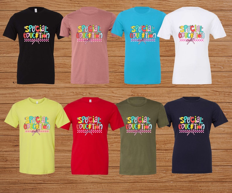 May include: Eight different color t-shirts with the text "Special Education" in colorful letters and a graphic of school supplies and a bow. The shirts are displayed on a wood background.