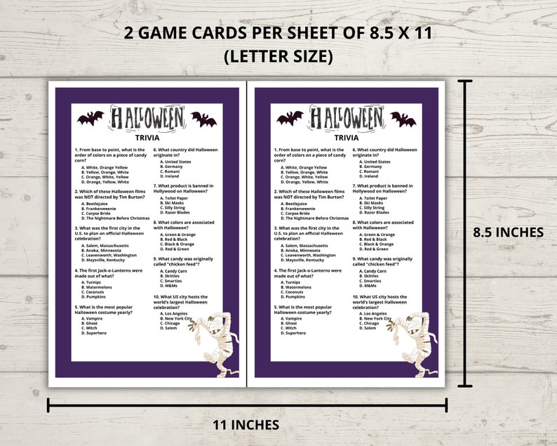 May include: Two printable Halloween trivia game cards with a purple background and black bats. The cards are 8.5 inches by 11 inches and feature questions about Halloween traditions, history, and popular culture. The cards are decorated with a mummy and a cat.