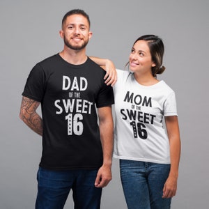 May include: A couple wearing matching black and white t-shirts with the text "Dad of the Sweet 16" and "Mom of the Sweet 16" printed on them.