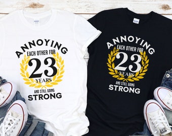 Funny 23rd wedding anniversary gifts for husband and wife: Annoying each other for 23 years, Matching 23 years anniversary shirt for Couple