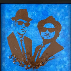 Retrato emoldurado dos Blues Brothers feito de fita cassete em painel de tela, pintura em aquarela com moldura de madeira maciça, arte original