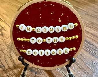 Heated Rivalry “I’m Coming To The Cottage” embroidery hoop (friendship bracelet)