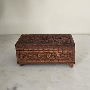 Vintage Hand-Carved Wooden Jewelry Box – Ornate Floral Design, Red Velvet Lining, Footed Keepsake Chest