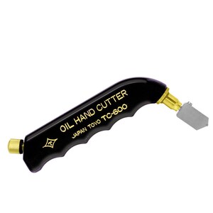 May include: Black oil hand cutter with a gold handle and a diamond logo. The handle has the text "OIL HAND CUTTER" and "JAPAN TOYO TC-600" printed in gold.
