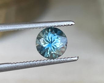 0.90 Carats, Natural parti sapphire, teal sapphire, 5.50x5.50 mm round shape, blue colour sapphire loose faceted gemstone.