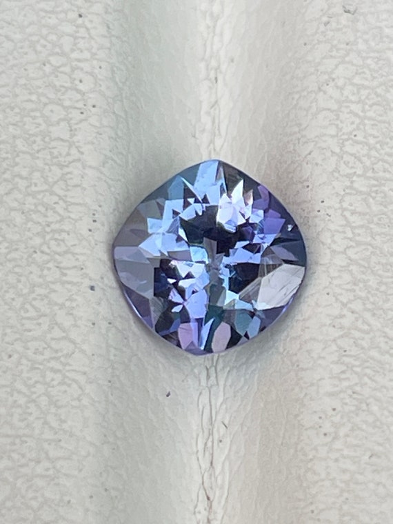 Natural unheated tanzanite (zoisite) rare peacock blue colour, 0.95ct weight, size is near to 6x6 MM, Loupe Clean, Rare Old Mine Stone