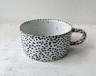 Handmade ceramic white coffee tea cups vessel with black spots. Danish studio ceramic whellthrown handcrafted cups mugs dalmation pattern.
