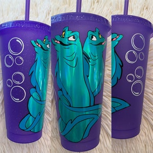 Disney Inspired Flotsam and Jetsam Ursula's pets with holographic vinyl on a Glitter Purple cold cup