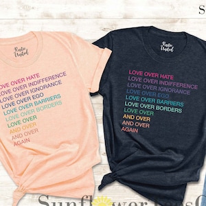 May include: Two t-shirts with the text "Love Over Hate" and a rainbow gradient. The text continues with "Love Over Indifference", "Love Over Ignorance", "Love Over Ego", "Love Over Barriers", "Love Over Borders", "Love Over", "And Over", "And Over", "Again".