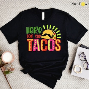 a t - shirt that says, hero for the tacos
