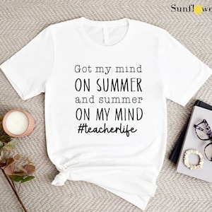a t - shirt that says, got my mind on summer and my mind on