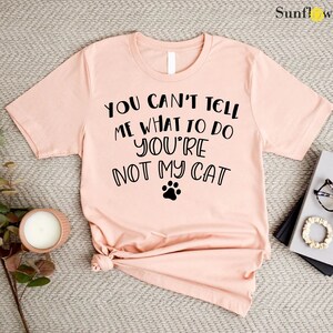 a t - shirt that says, you can't tell me what to do