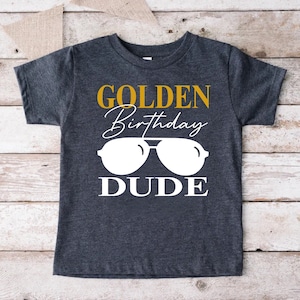 a t - shirt that says golden birthday dude