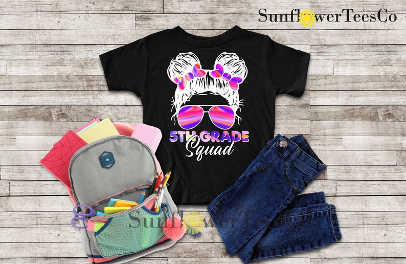 May include: Black t-shirt with a graphic of a girl with pigtails wearing sunglasses and the text "5th Grade Squad".