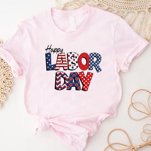 a pink shirt with the words labor day on it