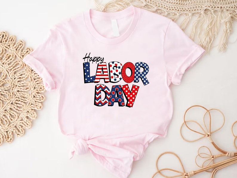a pink shirt with the words labor day on it
