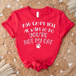 a red shirt that says you can't tell me what to do you '