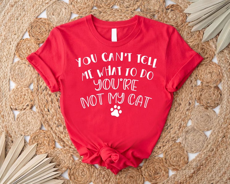 a red shirt that says you can't tell me what to do you '