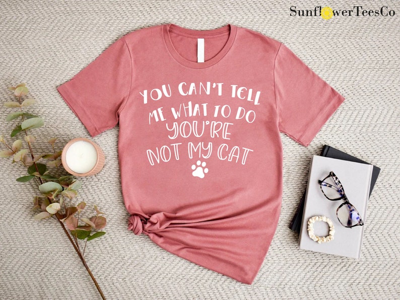 a t - shirt that says you can't tell me what to do with