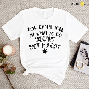 a t - shirt that says you can't tell me what to do with
