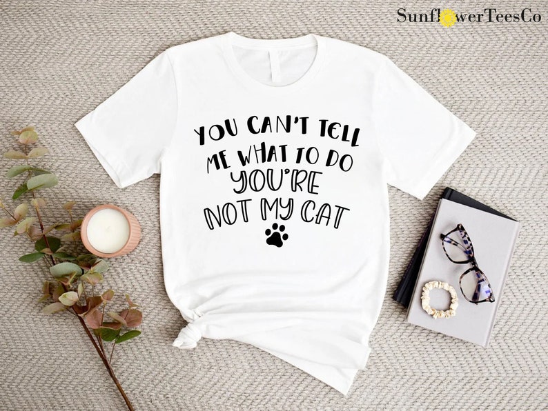 a t - shirt that says you can't tell me what to do with