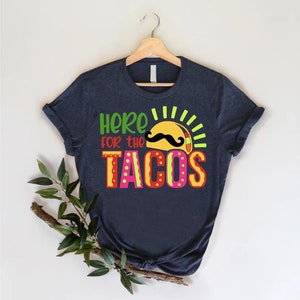 a t - shirt that says, hero for the tacos