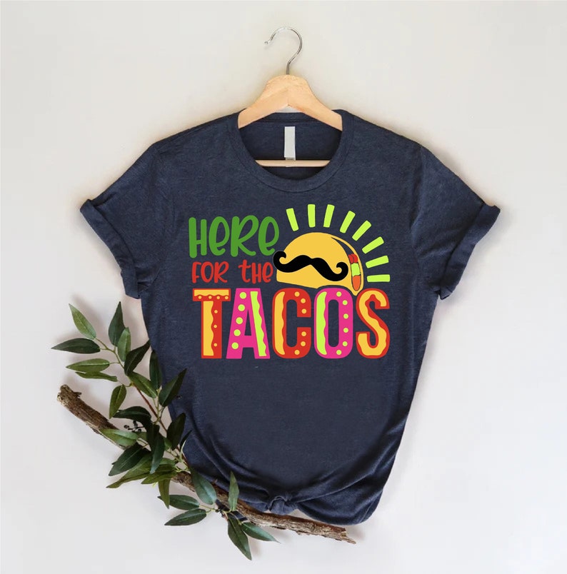 a t - shirt that says, hero for the tacos
