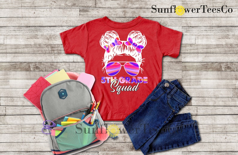 May include: Red t-shirt with a graphic of a girl with pigtails wearing sunglasses and the text "5th Grade Squad".