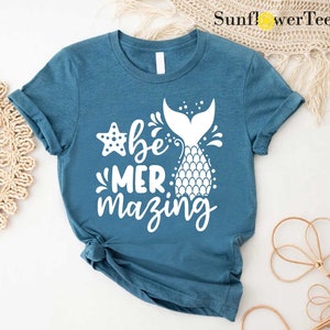 a t - shirt with the words be mermazing printed on it