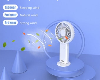 Mini portable USB handheld electric fan. WHITE