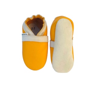 Soft yellow beige leather slippers