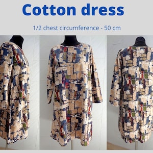 May include: A beige cotton dress with a geometric print in shades of blue, red, green, and brown. The dress has a round neckline and long sleeves. 1/2 chest circumference - 50 cm.