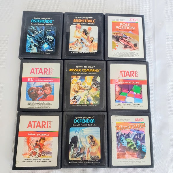 Vintage Atari 2600 video games Mario Bros. Donkey Kong Ms. Pac-man Frogger Video Cube plus more