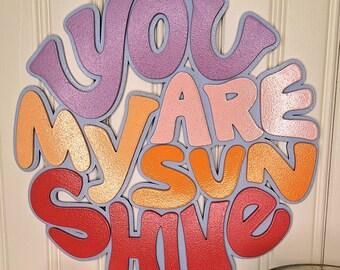 You Are My Sunshine Wood Sign - Spread happy vibes in your home with this groovy wood sign.