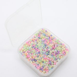 A small box of 12/0 2mm Pearlised Glass Seed Beads.  Approx 3300 beads.