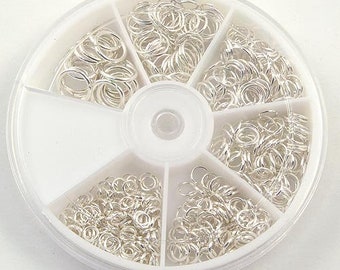 A Small Box of Assorted Silver Plated Jump Rings 4mm - 10mm. 500+ rings