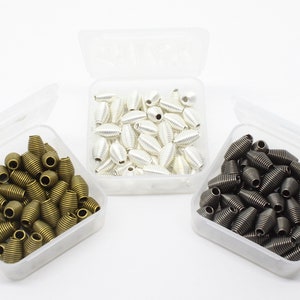 A Small Box of  50 Bicone Spring Beads 12mm x 6mm . Choice of Silver, Antique Bronze or Gunmetal Black plate.